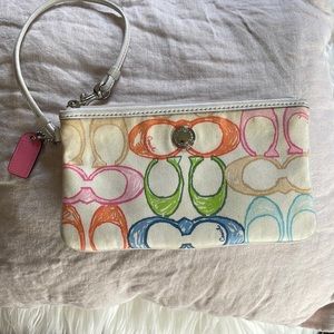 Vintage Coach wristlet with multi colored C s